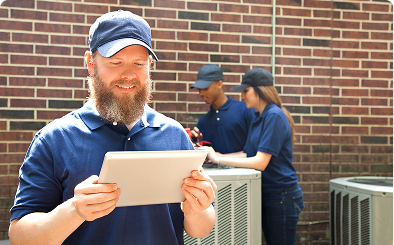 HVAC team working on air conditioning system